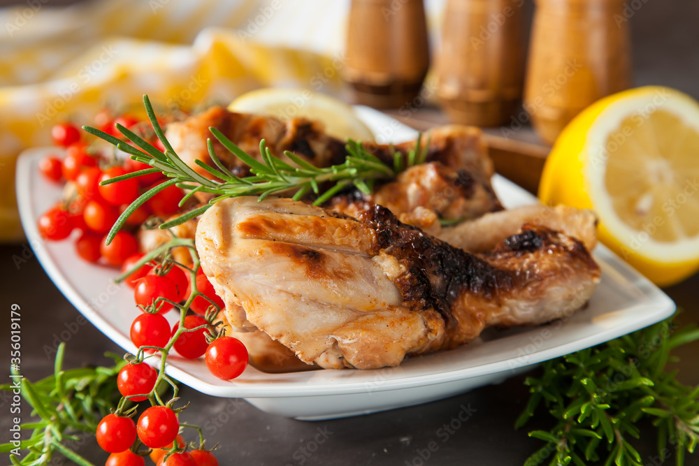 chicken legs a grill with seasonings on a table, selective focus chicken legs a grill with seasonings on a table, selective focus