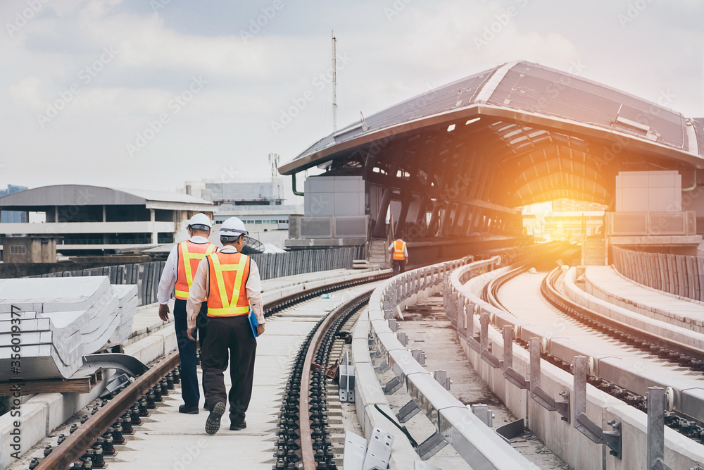Inspector Engineer checking railway construction work on