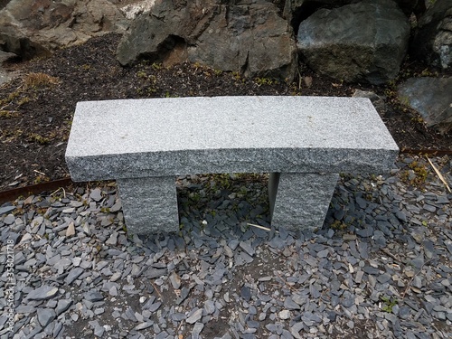 stone seat with rocks or stones and pebbles or gravel