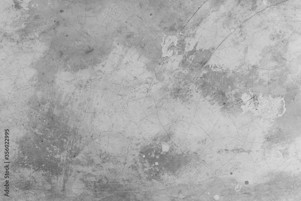 Fototapeta premium Grey tone cracked and scratched concrete wall texture : Cement background