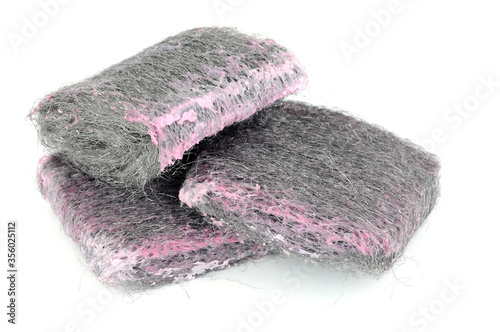 Soap filled wire wool scouring pads isolated on a white background photo