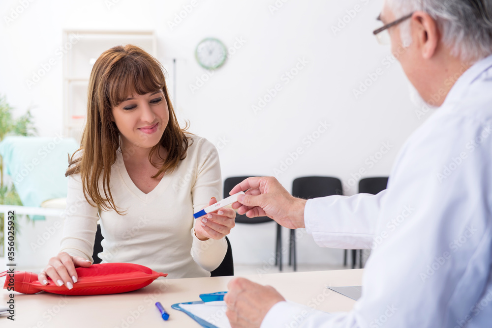 Pregnant woman visiting experienced doctor gynecologist Pregnant woman visiting experienced doctor gynecologist