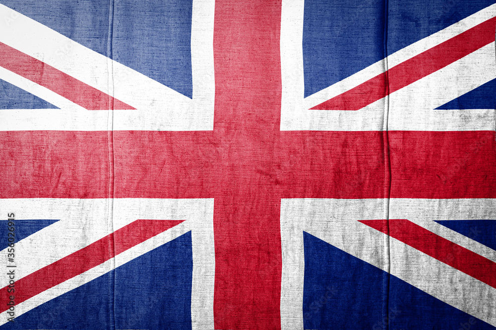 Fototapeta premium Flag banner on fabric texture background.