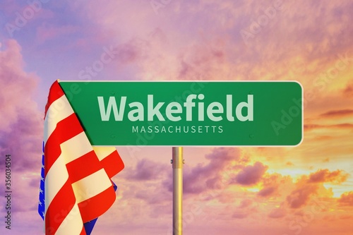Wakefield – Massachusetts. Road or Town Sign. Flag of the united states. Blue Sky. Red arrow shows the direction in the city. 3d rendering