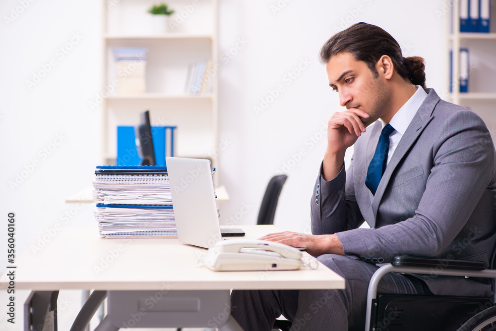 Disabled employee in the office Disabled employee in the office