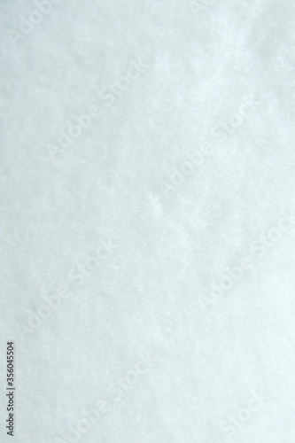 Texture of a universal household napkin for dry and wet cleaning. Napkin made of non-woven viscose and polyester.