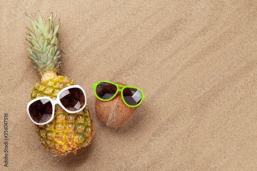 Pineapple and coconut with sunglasses
