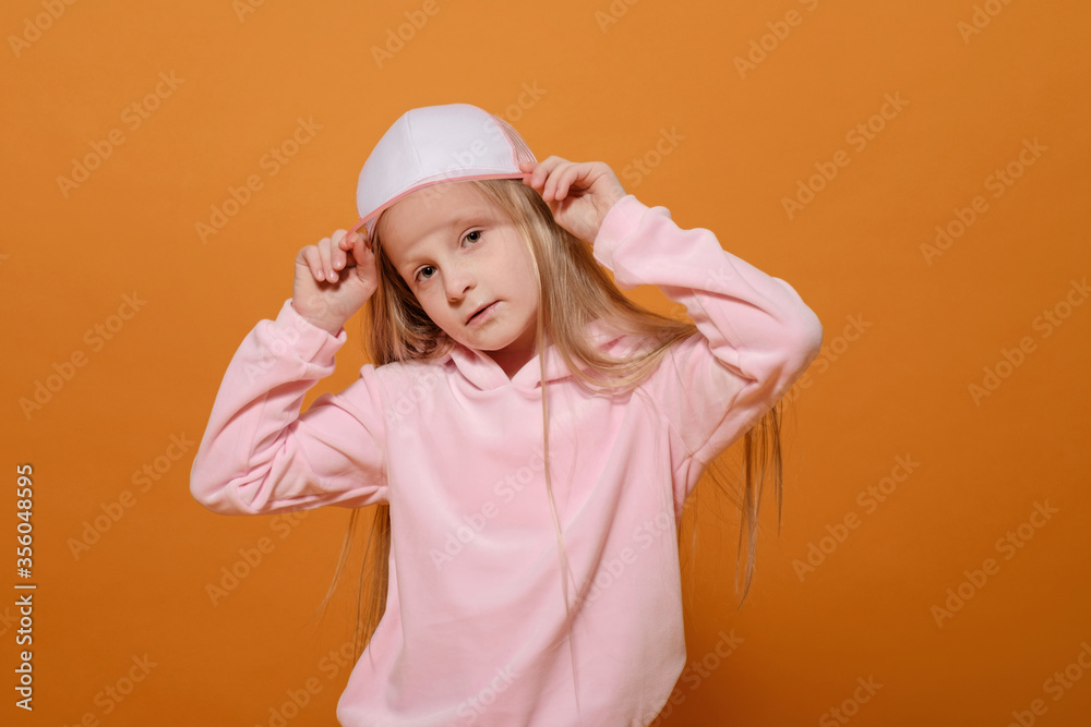 fashion model blonde girl in pink clothes on yellow background fashion model blonde girl in pink clothes on yellow background