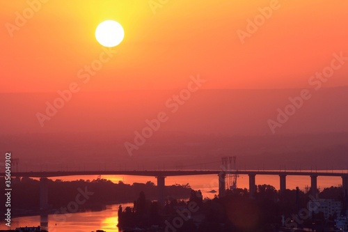 Sunset and fog over Asparuhov bridge in Varna (Bulgaria) photo