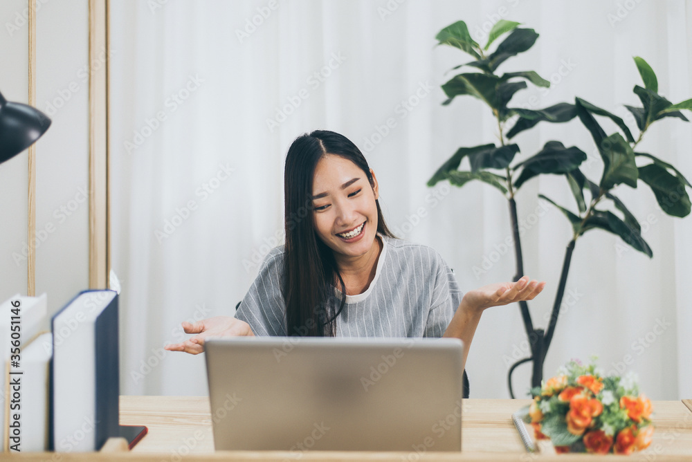 Beautiful young asian woman using video conference call to people Beautiful young asian woman using video conference call to people