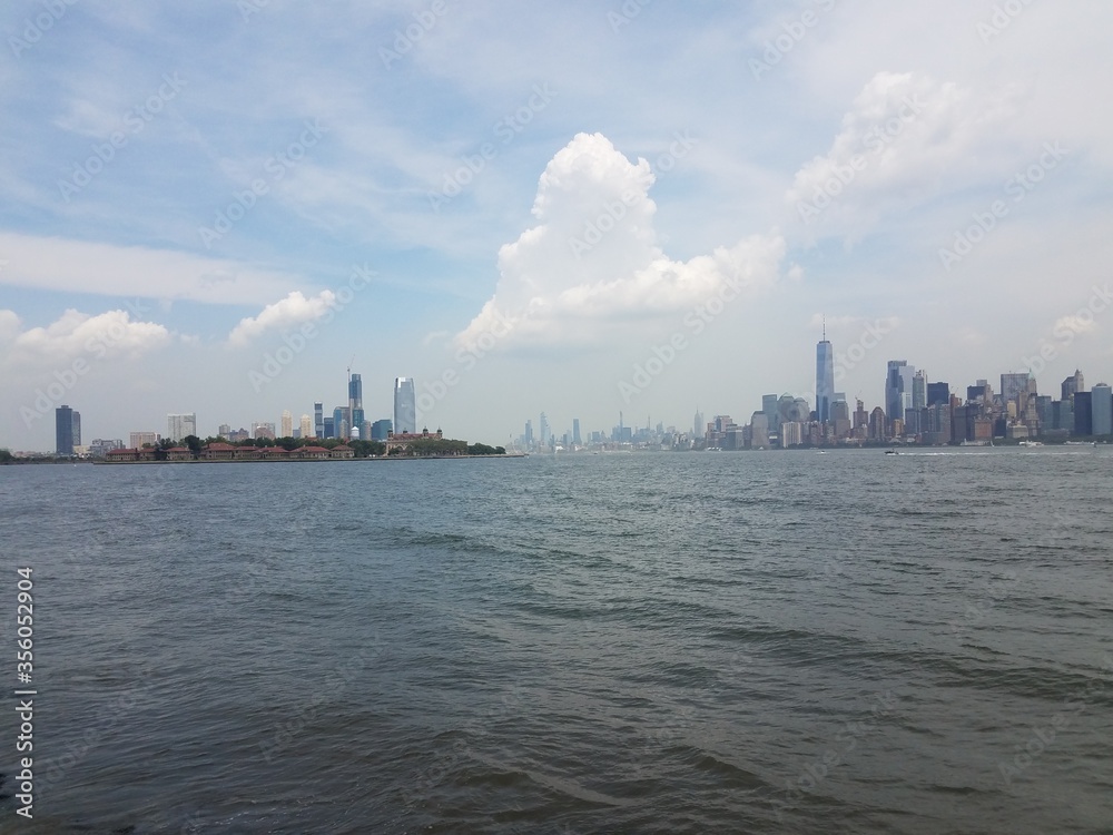 river water and buildings in New York and Manhattan
