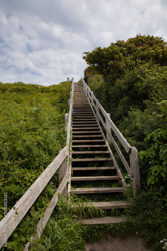 big staircase going up the hill to the blue ksy