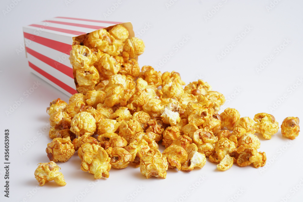 Caramel pop corn on box isolation white background. Copy space for text.
Caramel pop corn on box isolation white background. Copy space for text.