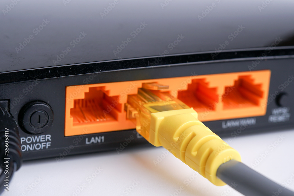 WiFi Modem Router ADSL connected with LAN RJ45 Cable. It is a LAN network connection ethernet cable. Internet cord RJ45
WiFi Modem Router ADSL connected with LAN RJ45 Cable. It is a LAN network connection ethernet cable. Internet cord RJ45