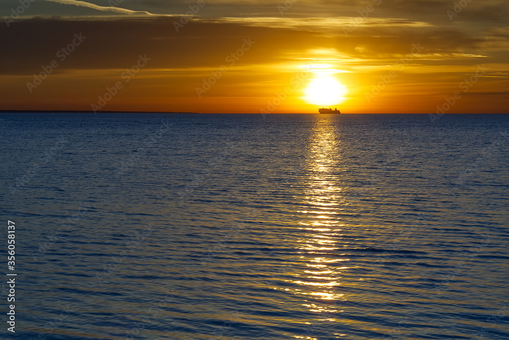 Fototapeta premium Sunset over the baltic sea. Beautiful sunset at Finland gulf.