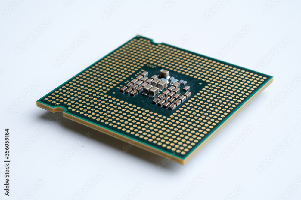 Close-up of modern CPU Chip Processor for tech science background. Selective Focus.
Close-up of modern CPU Chip Processor for tech science background. Selective Focus.