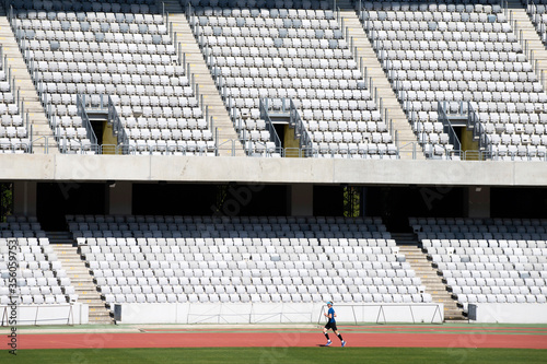 Soccer stadium with empty seats. © erika8213