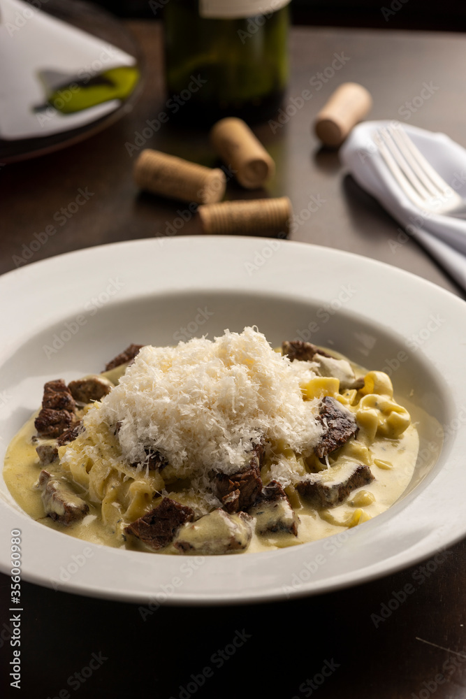 meat and cheese gnocchi pasta made with sirloin and white creamy sauce meat and cheese gnocchi pasta made with sirloin and white creamy sauce