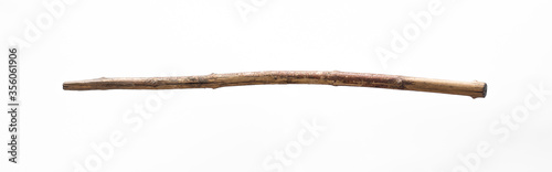 ancient wooden stick for walking isolated on white background