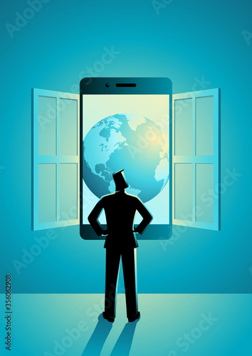 Businessman standing looking through window made of smart phone