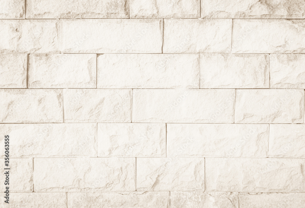 Obraz premium Brown brick wall texture background in room at subway. Brickwork stonework interior, rock old clean concrete grid uneven abstract weathered bricks tile design, horizontal architecture wallpaper.
