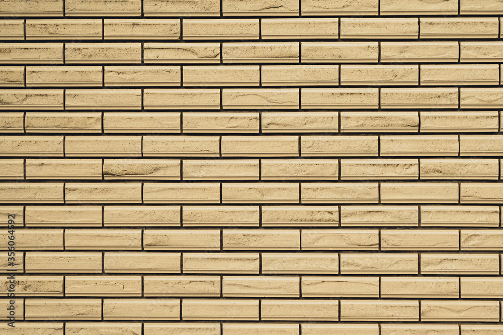 背景材料にもなるアイボリー色の壁模様