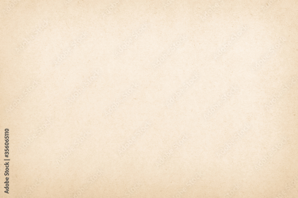 Brown recycled craft paper texture as background. Cream old vintage page or grunge vignette. Brown recycled craft paper texture as background. Cream old vintage page or grunge vignette.