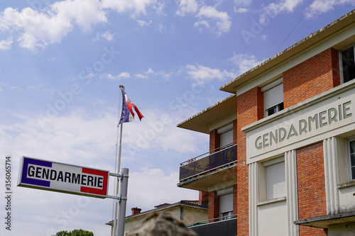 gendarmerie french military police sign logo and france flag in building office recruitment and information center photo