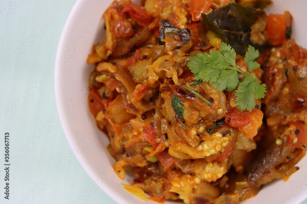 Baigan Bharta or Vangyache Bharit, a roasted and mashed eggplant fry or