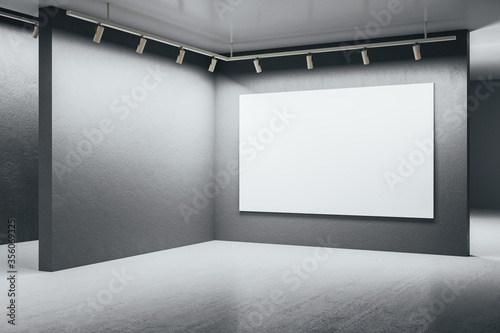 Fototapeta Naklejka Na Ścianę i Meble -  Modern gallery interior with blank poster on gray wall