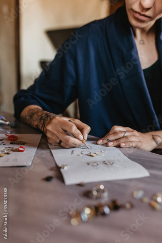 woman working in a workshop and drawing 