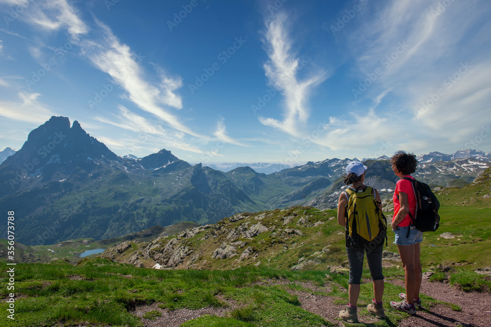 two hiker women in path of the french Pyrenees mountains