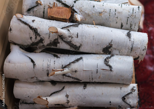 Fototapeta Naklejka Na Ścianę i Meble -  birch firewood in the winter folded in a pile