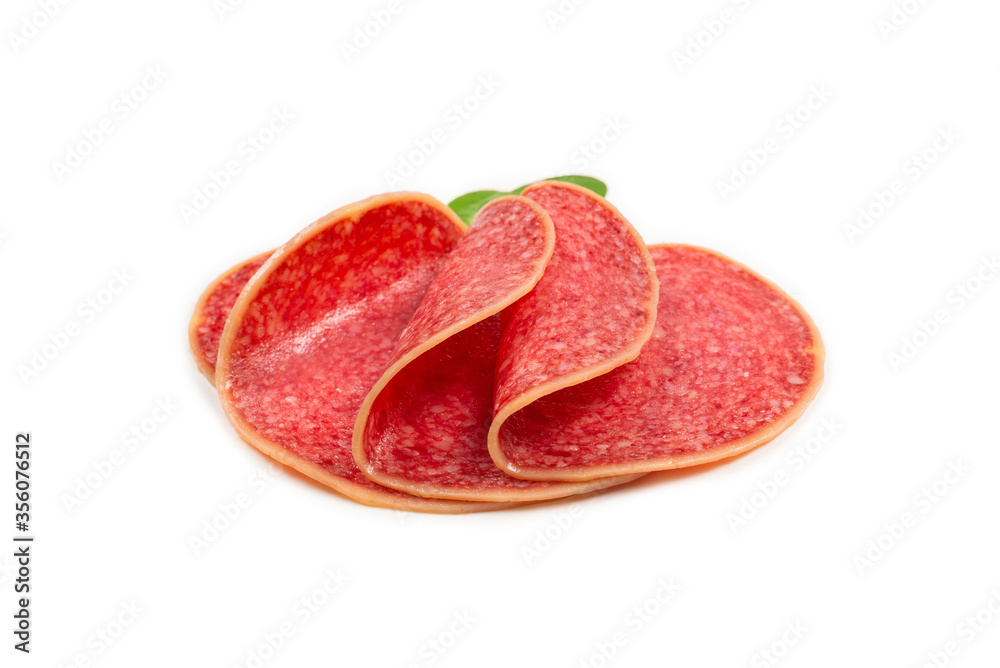 Salami slices isolated on white background. Salami slices isolated on white background.