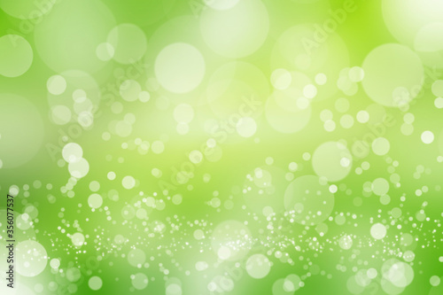 Abstract bokeh on green blurred background.