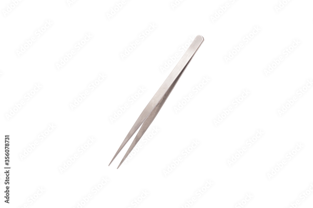 Metal tweezers on an isolated white background Metal tweezers on an isolated white background