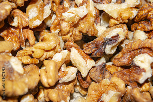 Peeled walnuts close-up. Surface texture. Healthy diet.