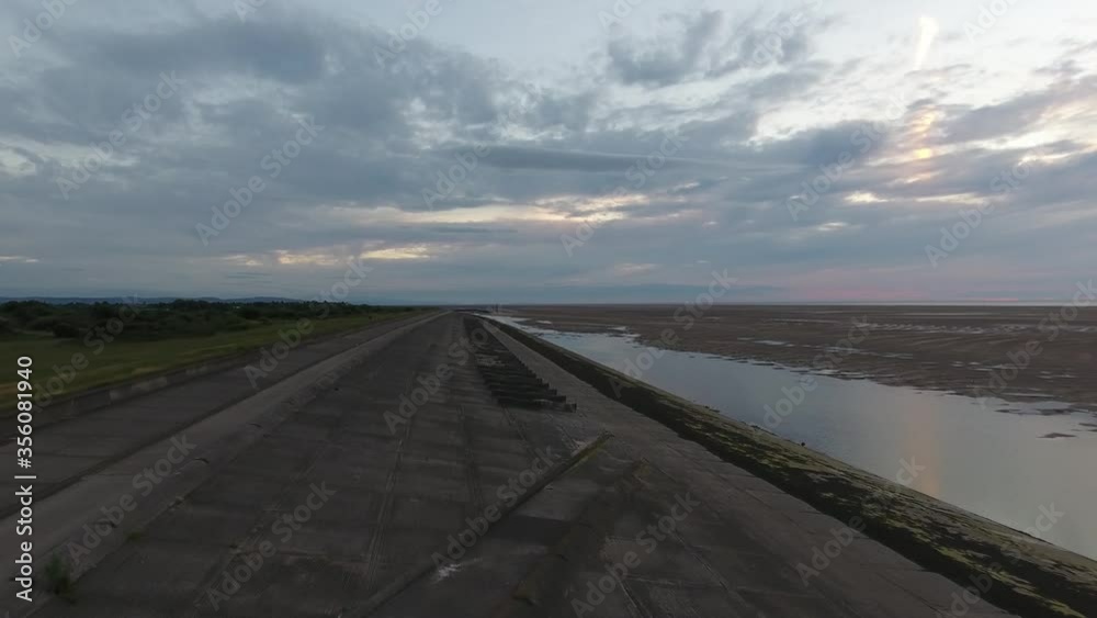 Low Tide River Dee Thurstason UK Drone Aerial View Low Tide River Dee Thurstason UK Drone Aerial View