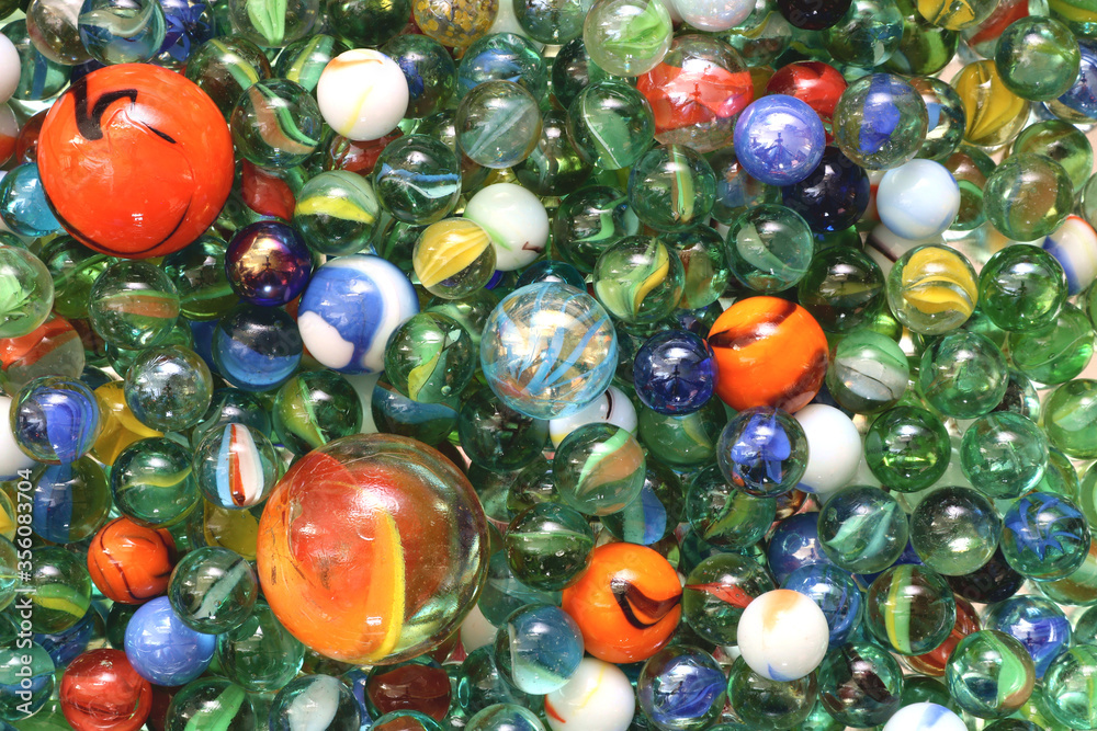 Glass toy marbles of various sizes and colours. Glass toy marbles of various sizes and colours.