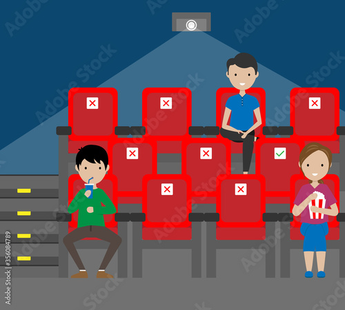 People in the cinema with social distance