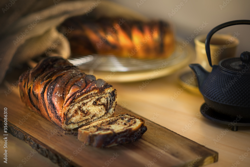 Babka, traditional jewish bread-like cake swirled with chocolate or cinnamon and often topped with nuggets of cinnamon-sugar streusel, popular mainly in America, where it was brought by immigrants.