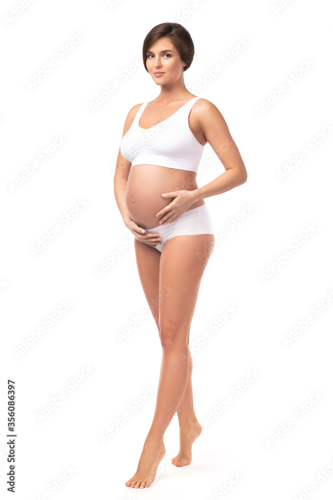 Young and beautiful pregnant woman on white background Young and beautiful pregnant woman on white background