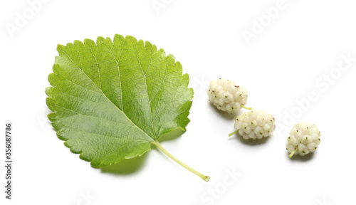 White mulberries with leaf isolated on white background photo