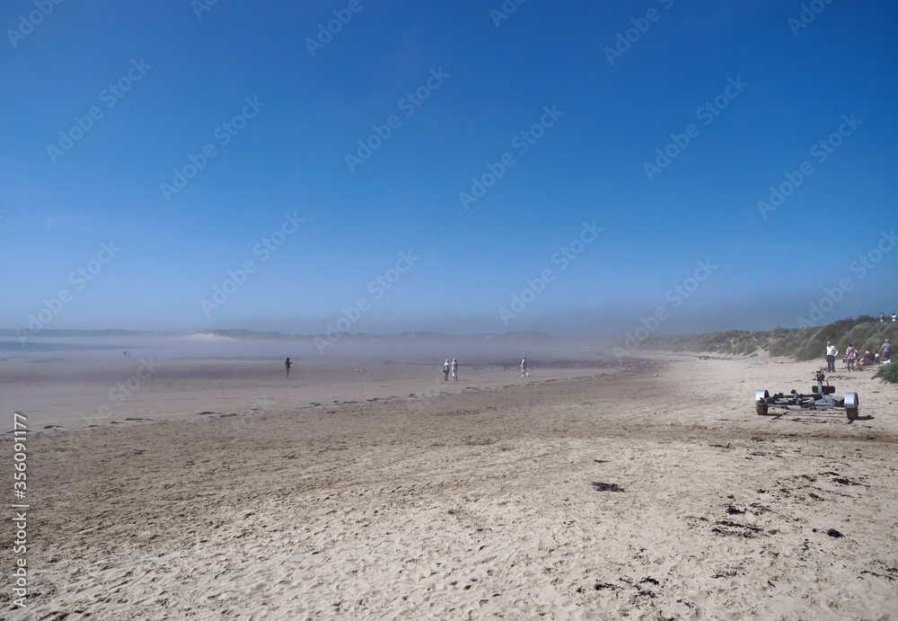 Early morning Sea Mist coming off the east coast of Beadnell Bay in Northumberland, in England, UK