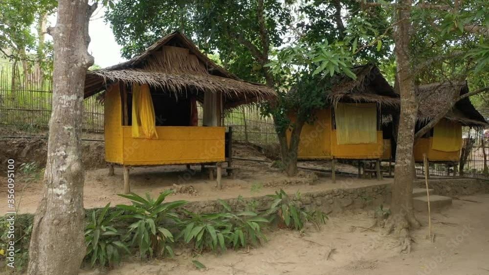 Raised sleeping huts with thatch roof in the island of Culion in the ...