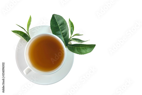 Top view white ceramic cup of tea with green tea leaves isolated on white background