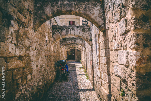 Medieval arched street in the old town of Rhodes  Greece