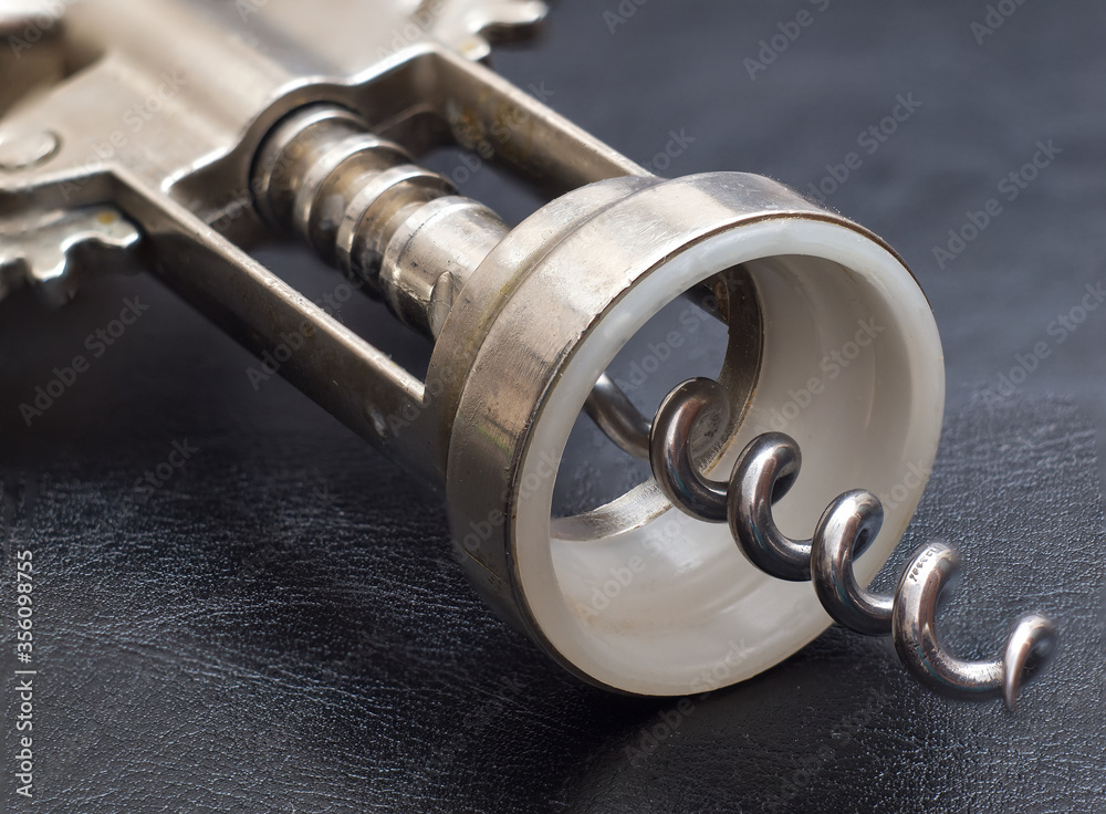 Kitchen utensils. close up of metal corkscrew Kitchen utensils. close up of metal corkscrew