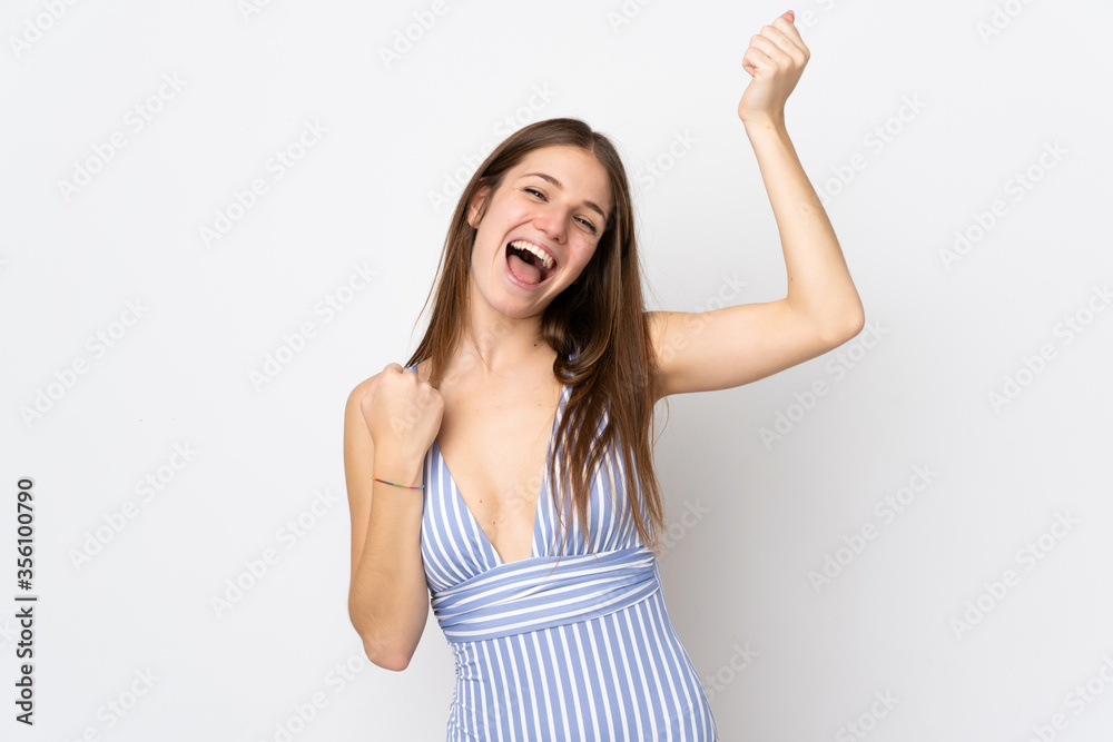 Fototapeta premium Young caucasian woman isolated on white background in swimsuit in summer holidays