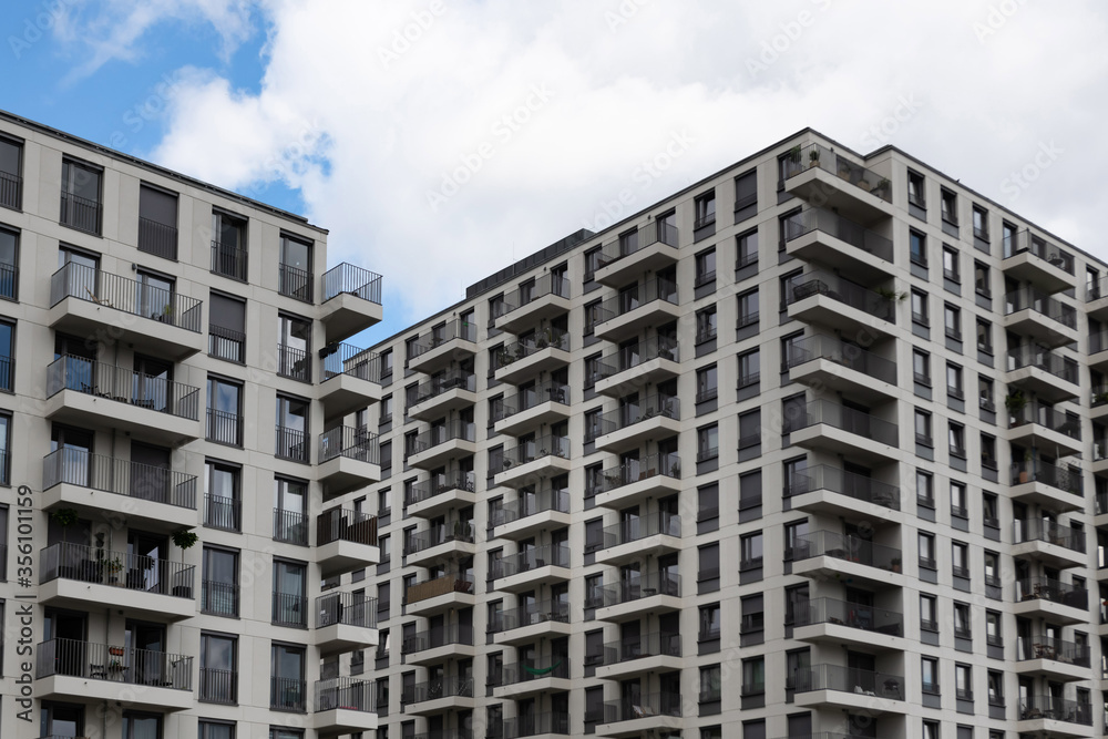 Modern large apartment buildings with balconies in Berlin.